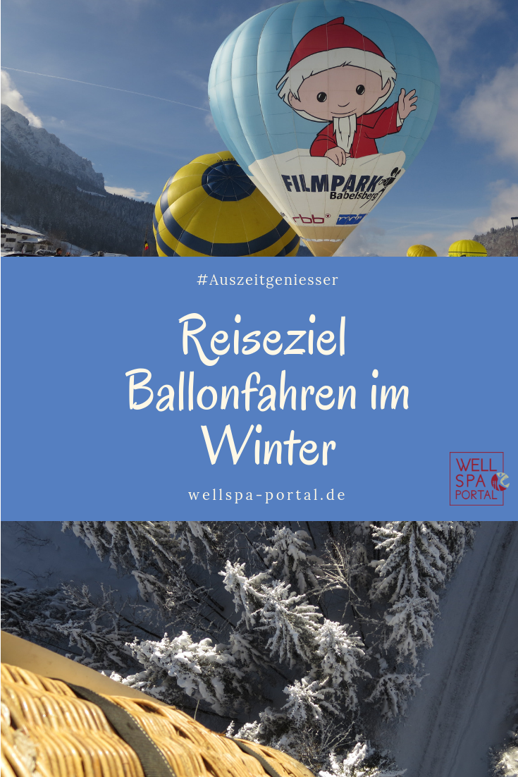 Ballonfahren im Winter, ein Reiseziel für puren Genuss. Im Heißluftballon über der verschneiten Winterlandschaft schweben. Auszeit vom Alltag beim Heissluftballonfahren in der kalten Jahreszeit